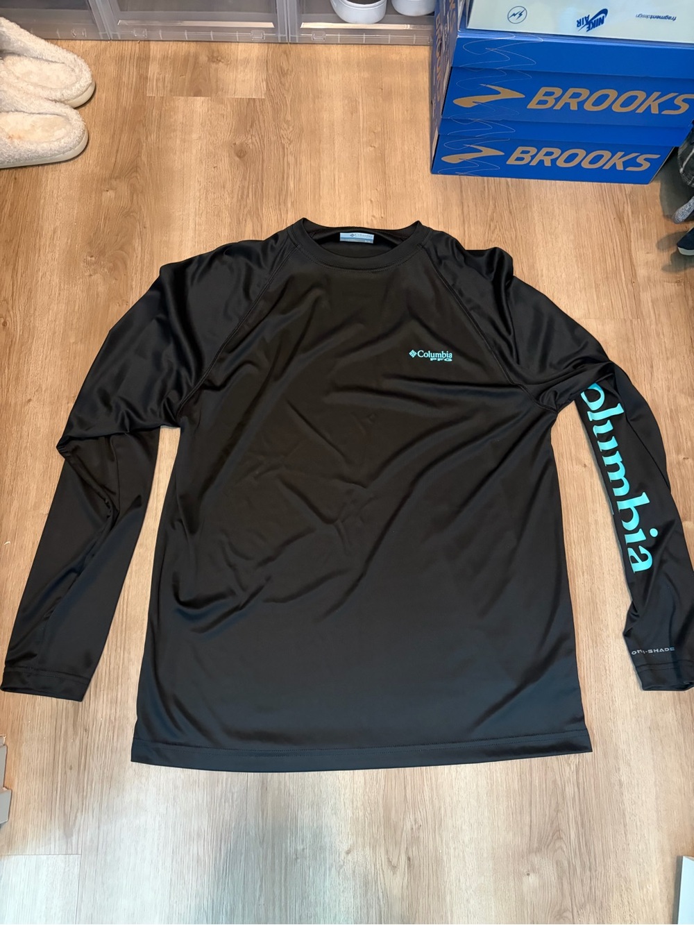 Columbia Black Long-Sleeve Performance Shirt with Teal Logo